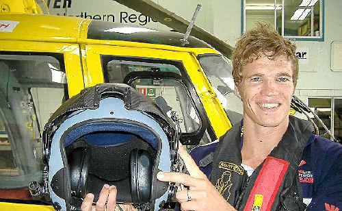 Senior rescue crewman Jethro Lampe with one of the rescue helmets fitted with a camera. Senior rescue crewman Jethro Lampe with one of the rescue helmets fitted with a camera.